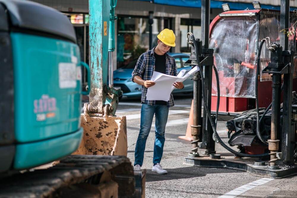 Safety Officer is reviewing the checklist for routine forklift maintenance